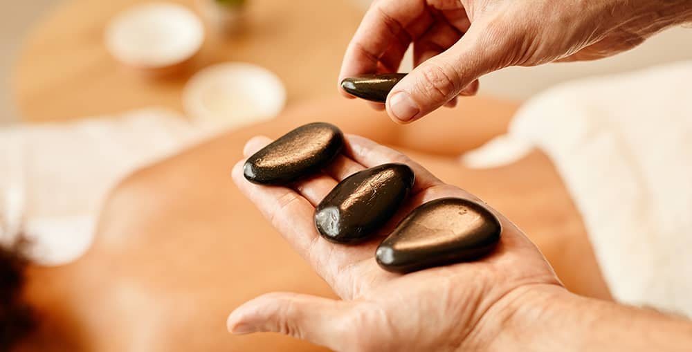 What Are the Health Conveniences of a Hot Stone Massage?
